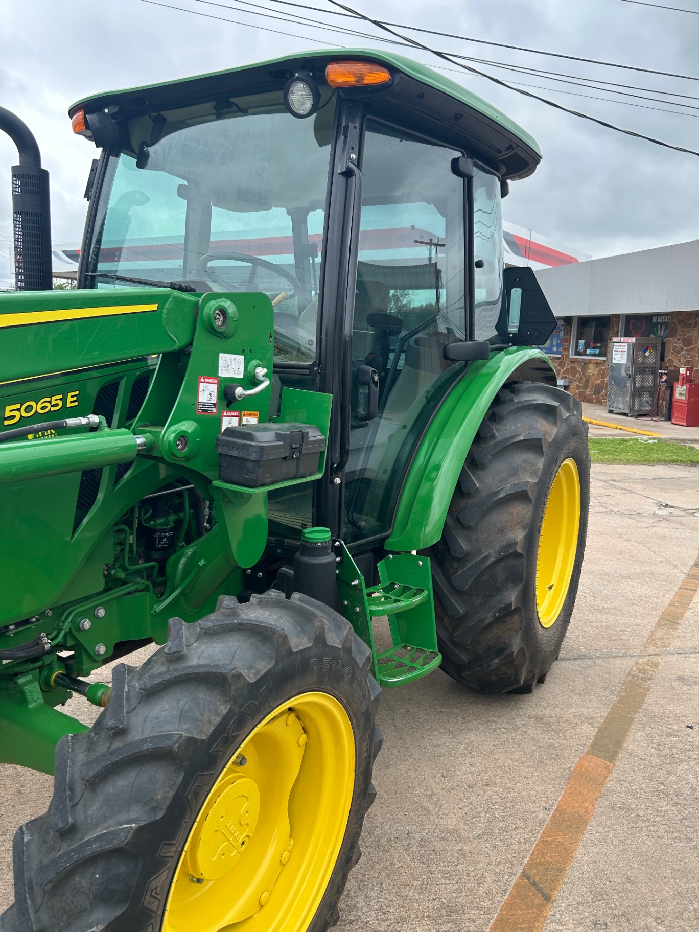 John Deere 5065E tractor cab after tint with improved glare reduction