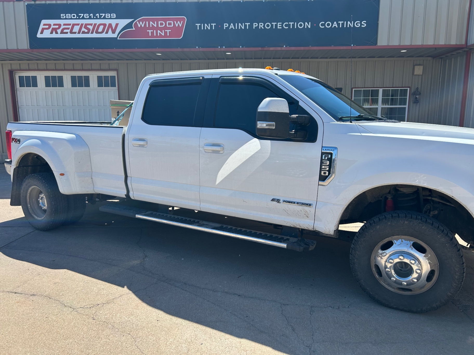White Ford F-350 Lariat dually with window tint at Precision Window Tint