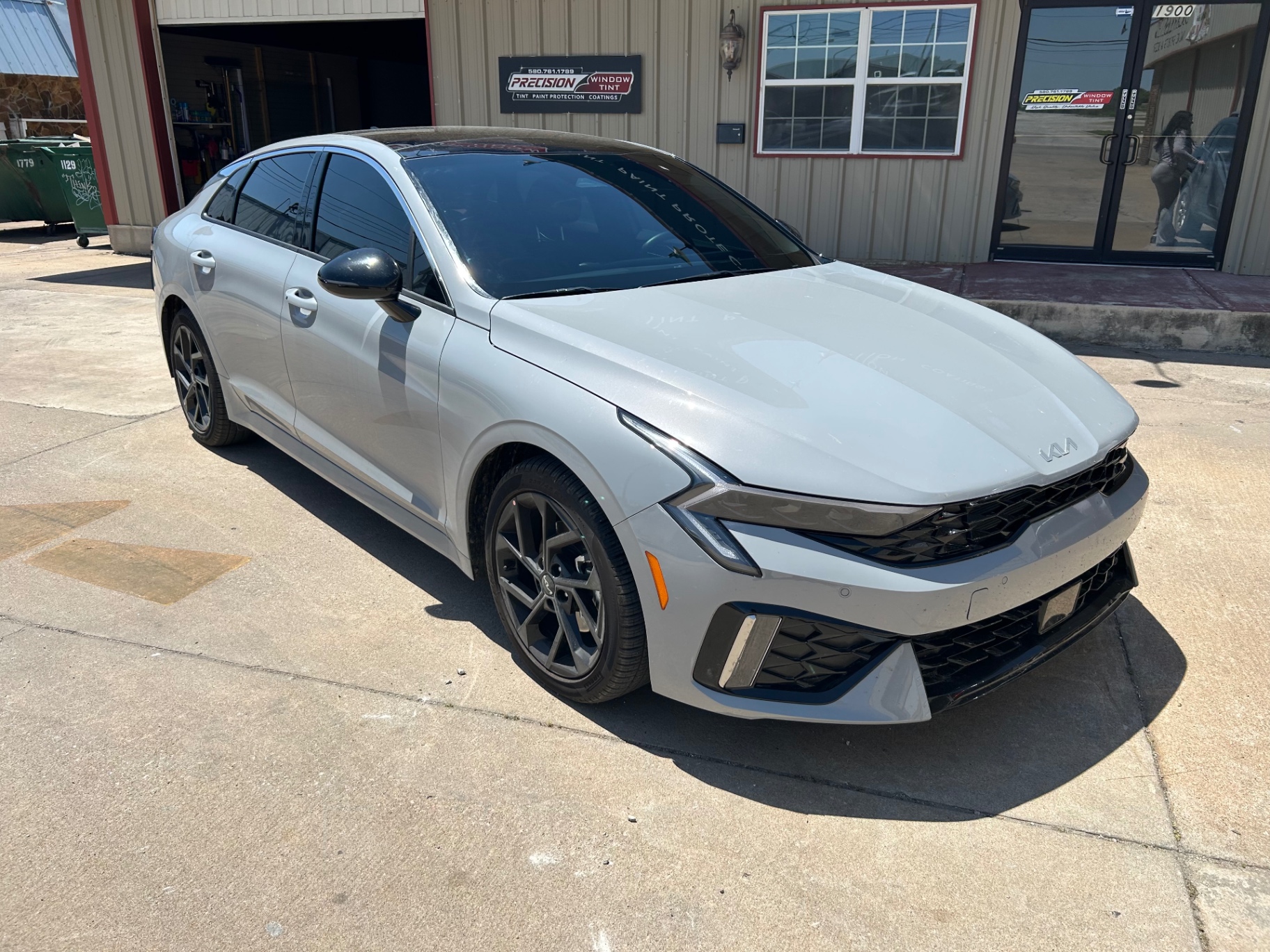 Gray Kia K5 GT with premium window tint installed in Ponca City OK