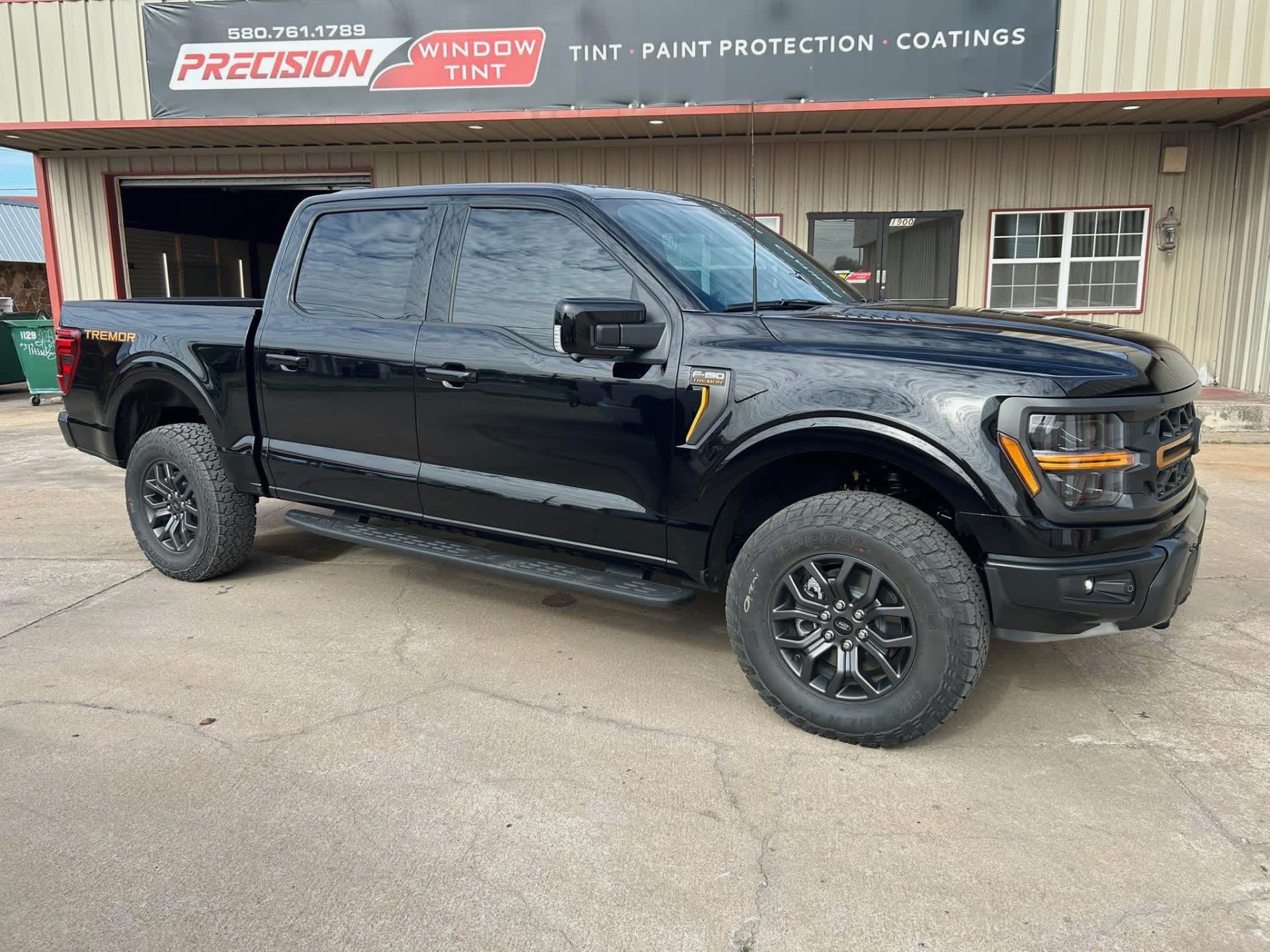 Black Ford F-150 Tremor with limo dark window tint — Ponca City Oklahoma