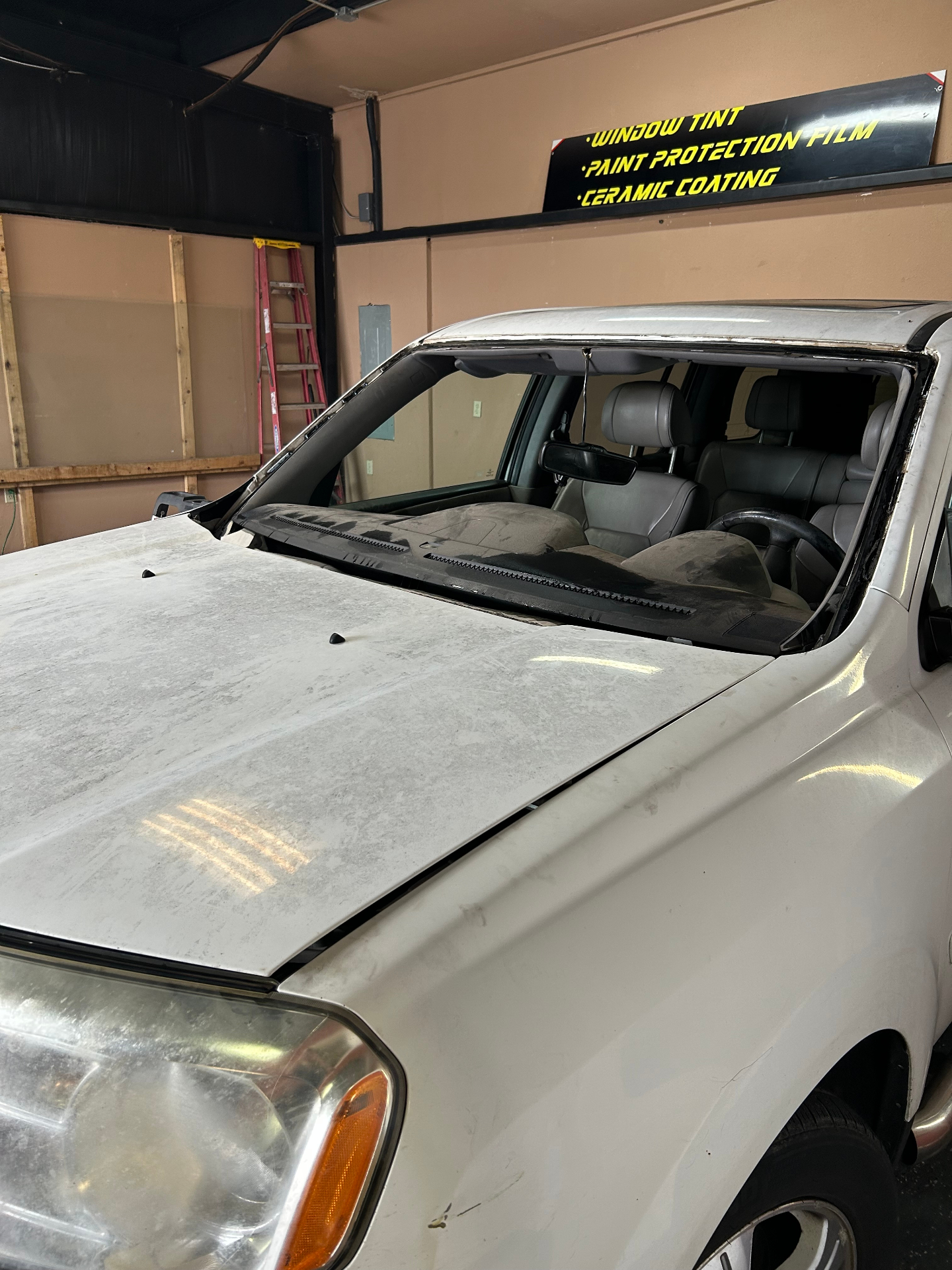 Vehicle before windshield replacement begins