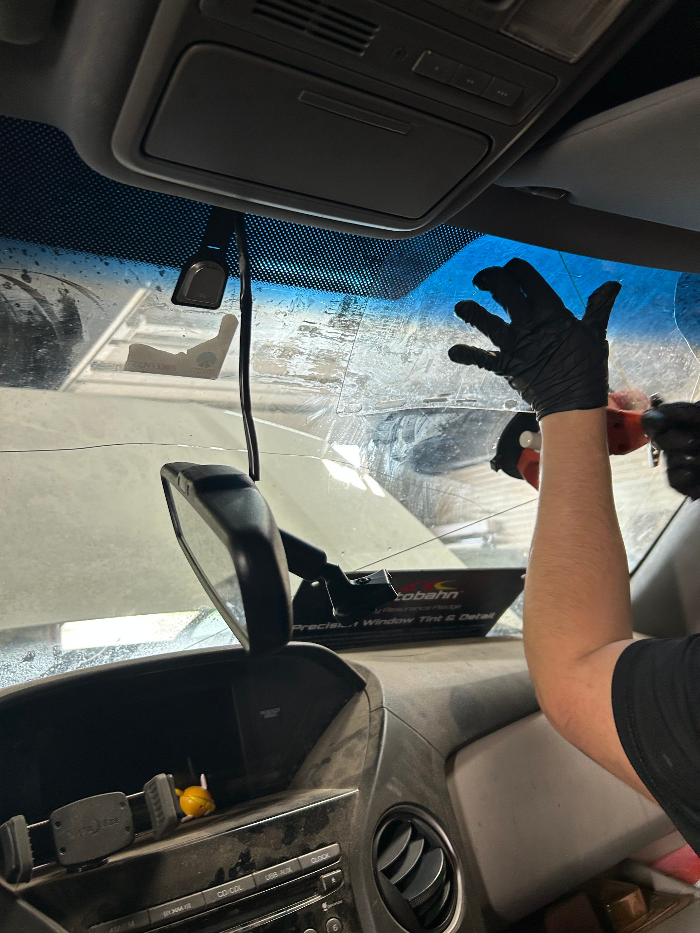 Inside view of windshield removal and auto glass service