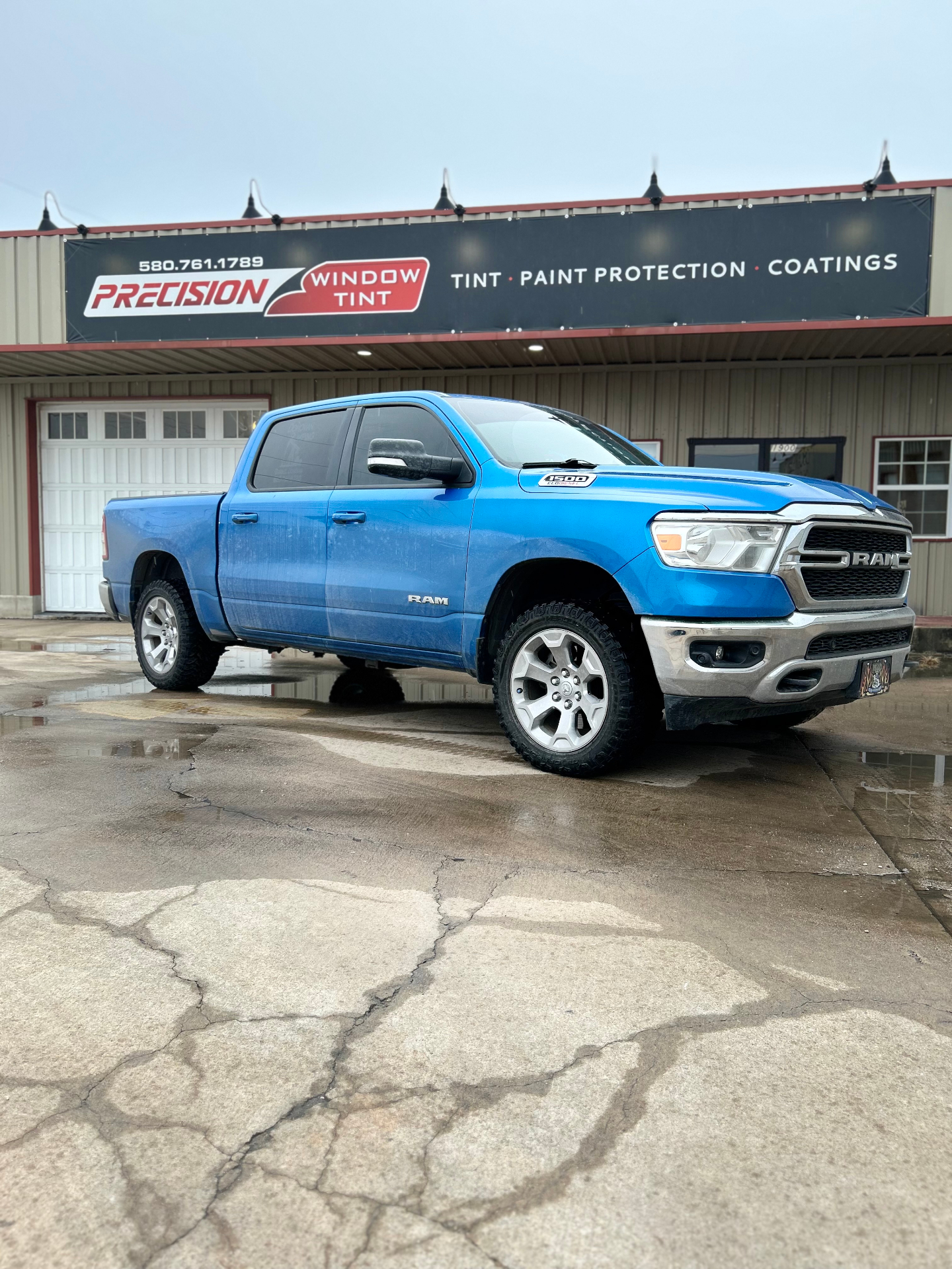 Blue Ram 1500 truck with completed window tint