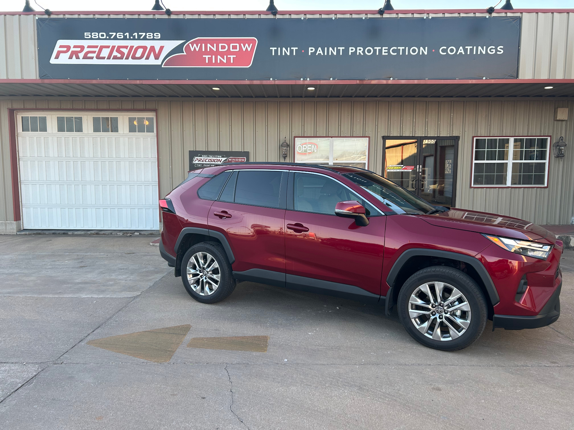 Red Toyota RAV4 with new window tint installation