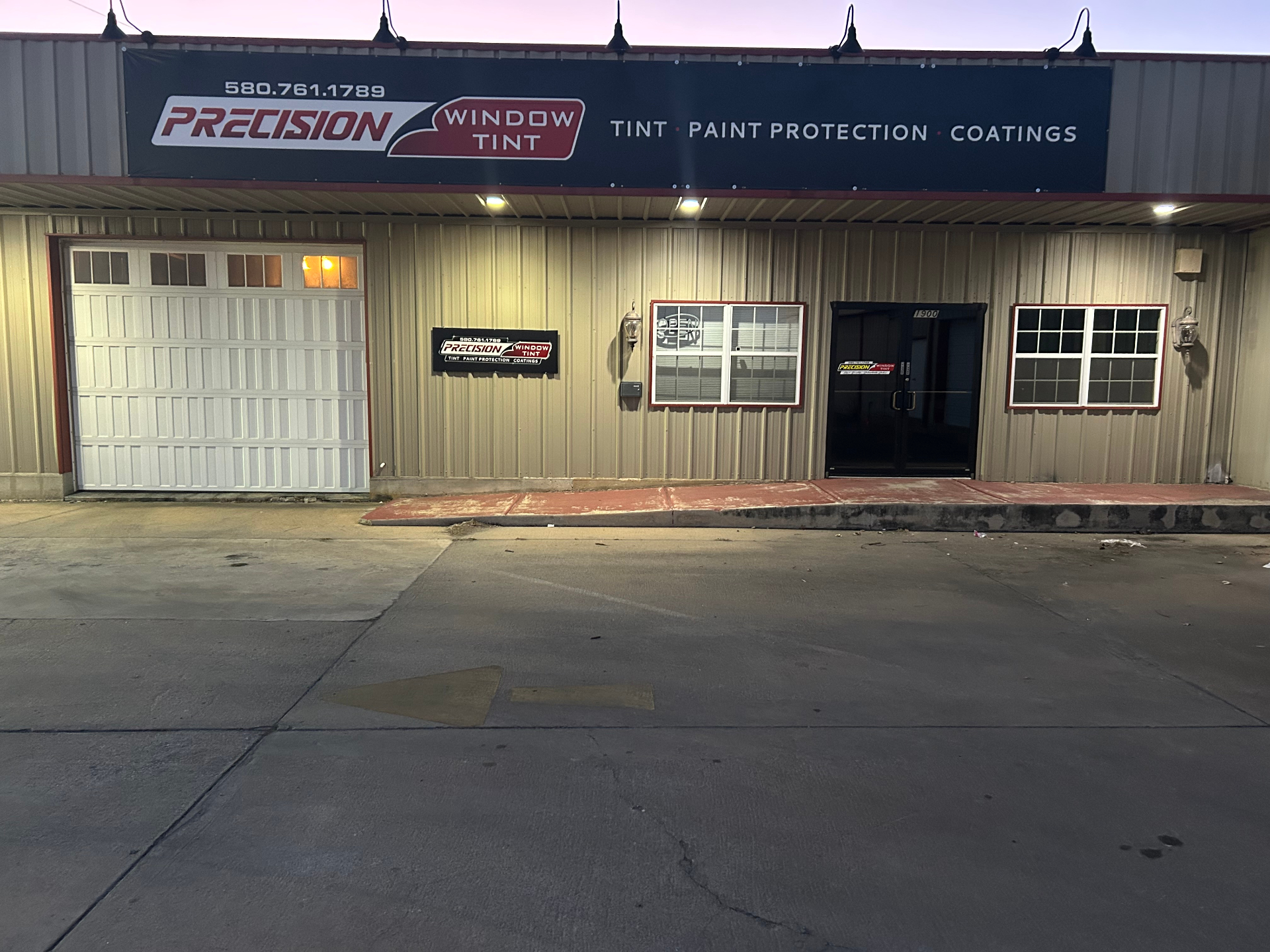 Precision Window Tint storefront exterior at dusk