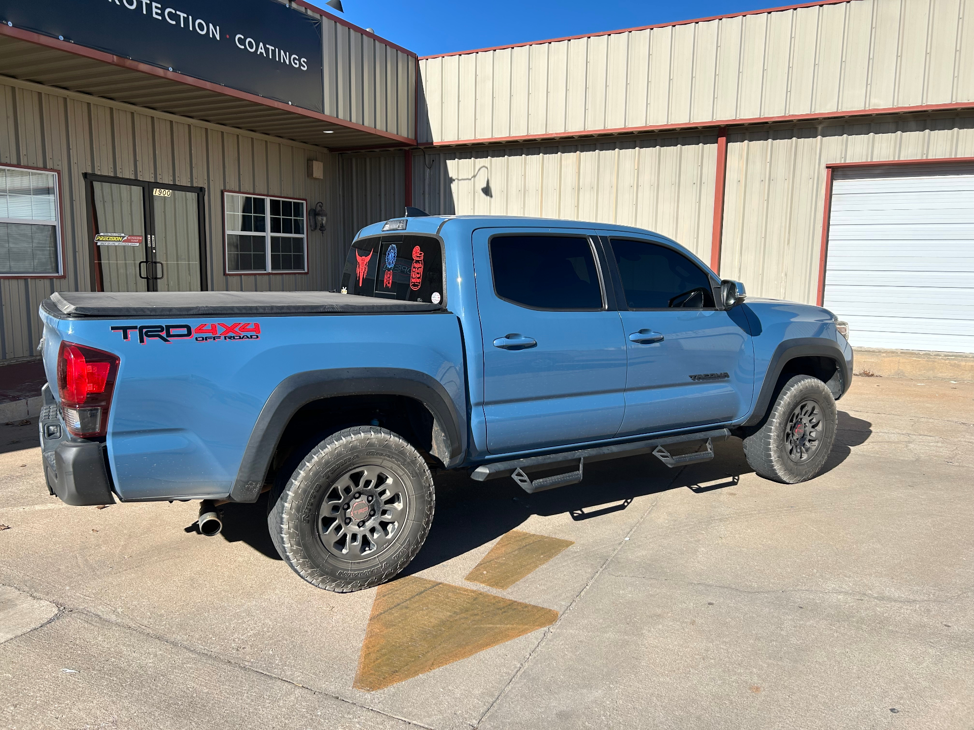 Blue Toyota Tacoma with professional window tint