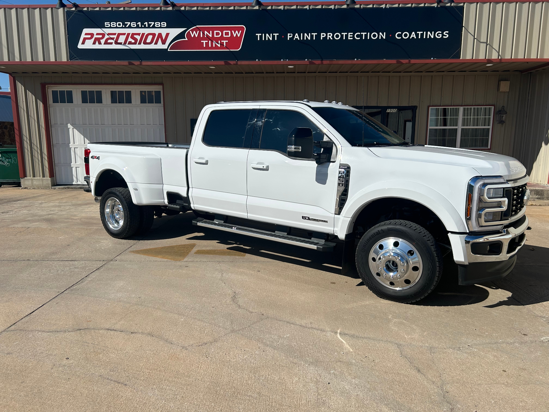 White Ford F450 dually truck with professional window tint